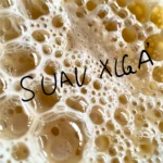 Logo for "Cozinha Molecular" (Molecular Kitchen) with chemical structures.