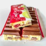 Three KitKat bars in lime, passion fruit, and raspberry flavors.