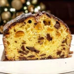 Slice of Lindt Panettone with orange and chocolate.